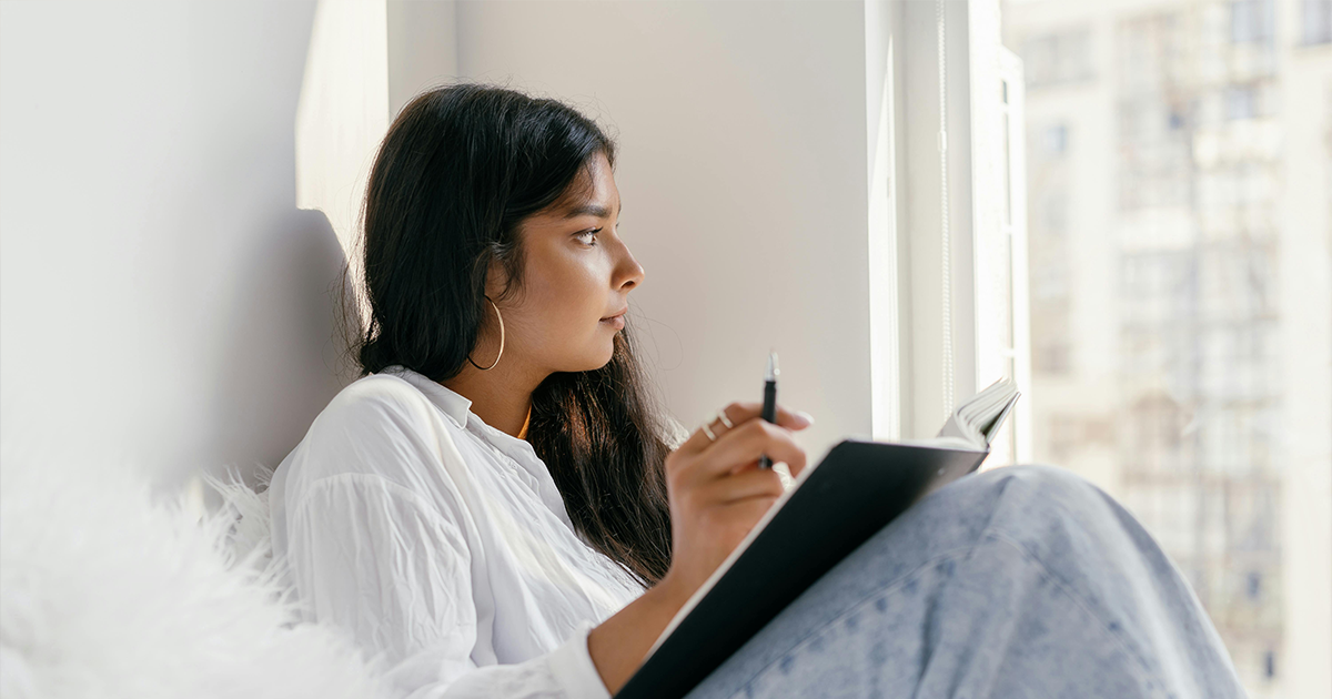 February 2 – 2025 Woman thoughtfully researching and comparing the different types of abortion.